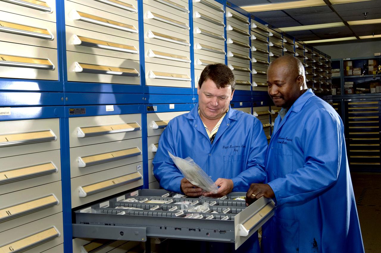 ALLEN OSMER AND NATHAN HOLLEY, MSFC FLIGHT HARDWARE