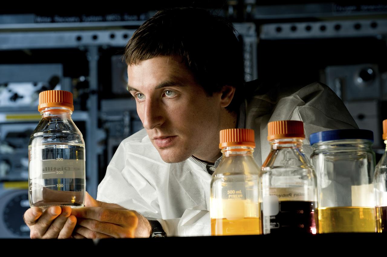 MATT MANSELL POSES FOR A PHOTO ILLUSTRATING THE ECLSS PROGRAM