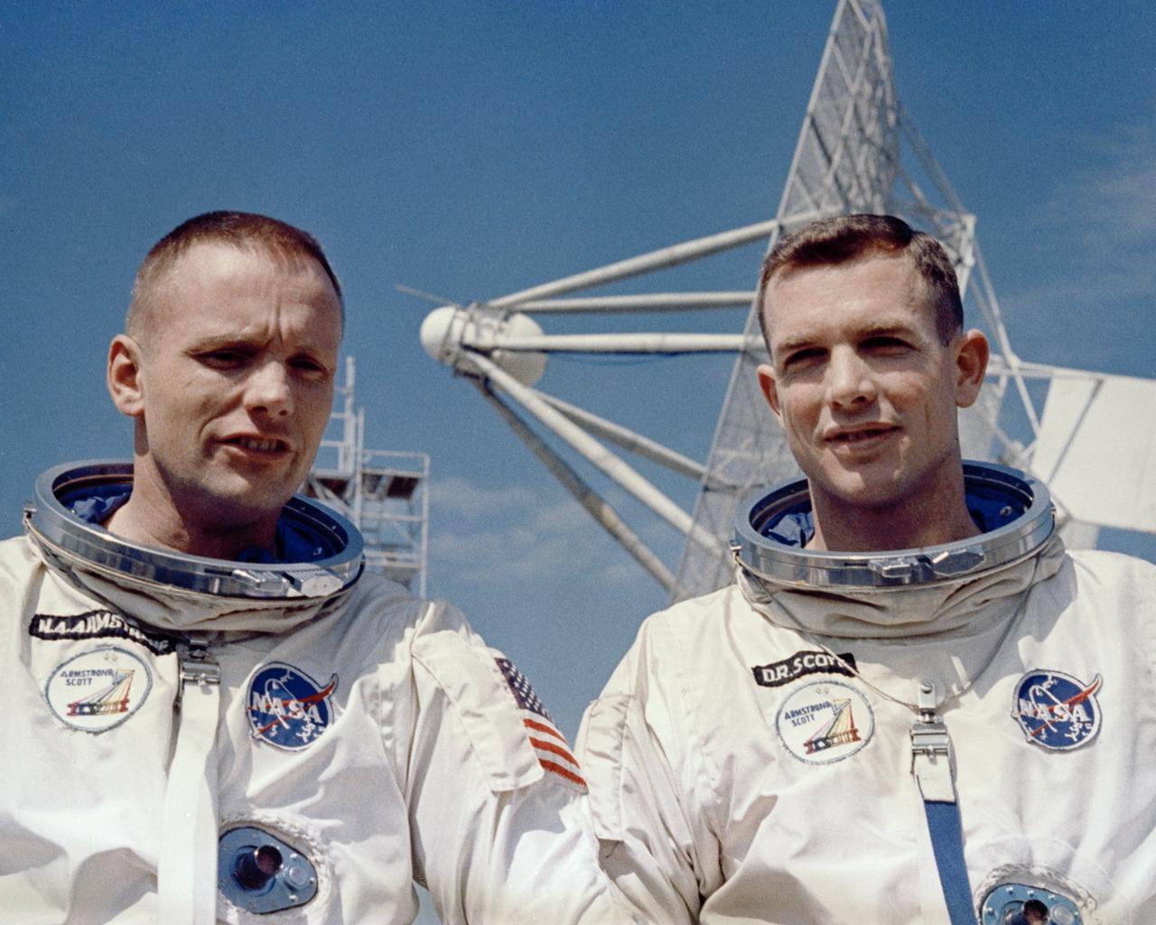 CAPE CANAVERAL, Fla. – Gemini 8 astronauts Neil A. Armstrong, command pilot, and David R. Scott, pilot, during a photosSession for the press outside Mission Control Center, Cape Kennedy.   Photo credit: NASA