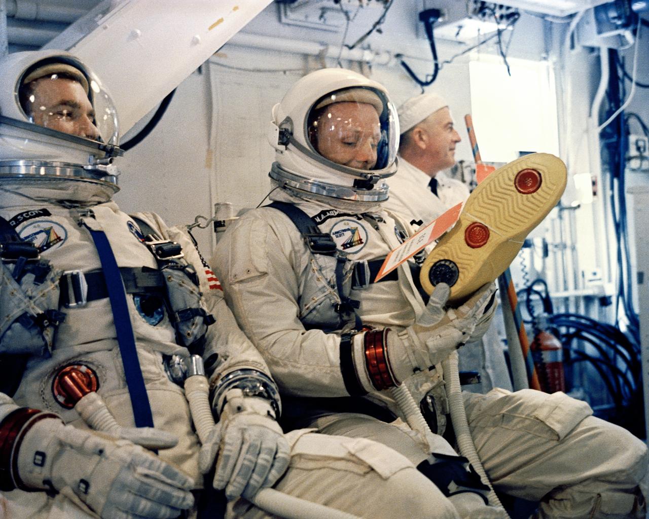 KSC-66C-1875 Astronauts David Scott and Neil Armstrong wait for the order to board their Gemini 8 Spacecraft in the White Room at Cape Kennedy, Complex 19. (jrs)