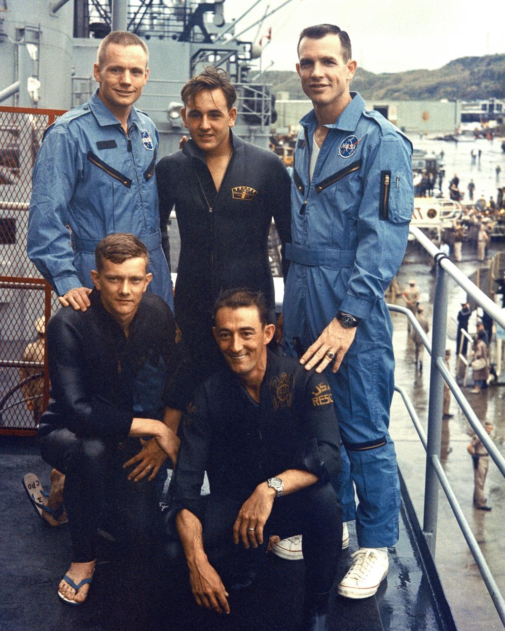 KSC-66C-1878 Gemini 8 Astronauts pose with the PARA-RESCUE team. Left-to-right, top: Neil Armstrong, E. M. Neil, David Scott; bottom row: L. D. Huyett and G. N. Moore. (jrs)