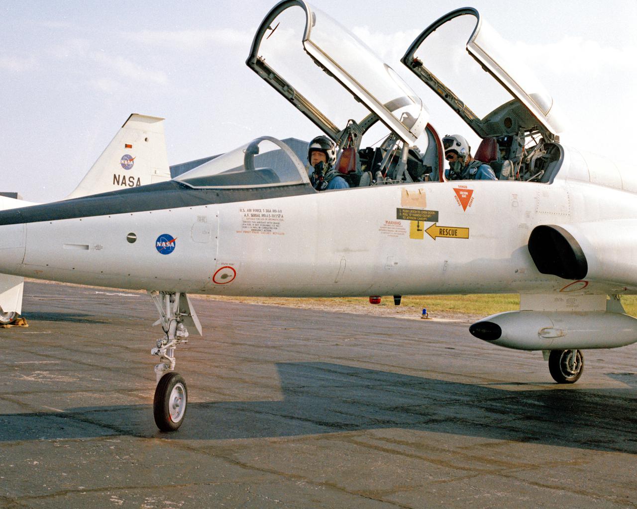 PATRICK AFB, Fla. – In preparation of the nation’s first lunar landing mission, Apollo 11 crew members arrive at Patrick Air Force Base, Florida. Mission commander Neil A. Armstrong is in the front seat of the T-38 jet, with chief astronaut and director of flight crew operations, Donald K. Slayton, in the back. Lift off atop a Saturn V launch vehicle is scheduled for July 16, 1969. During Apollo 11 the command module, Columbia, will remain in orbit around the moon while the lunar module, Eagle, carrying Armstrong and Aldrin, lands on the lunar surface. During 2½ hours of surface exploration, the crew plans to collect lunar surface material for analysis back on Earth. For more: http:__www-pao.ksc.nasa.gov_history_apollo_apollo-11_apollo-11.htm Photo credit: NASA