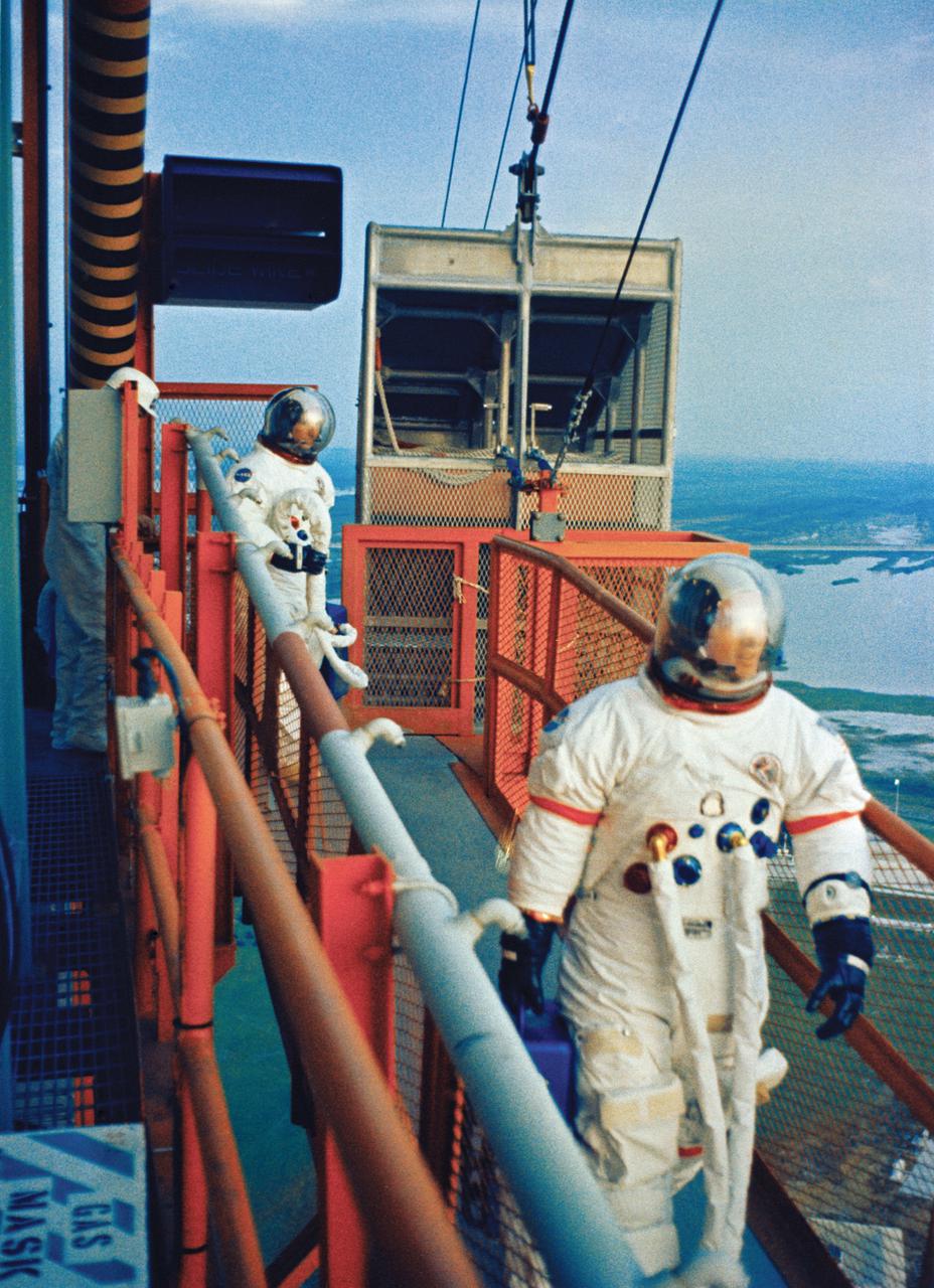 CAPE CANAVERAL, Fla. – The Apollo 15 crew walks around the launch tower July 14, 1971. Photo credit: NASA