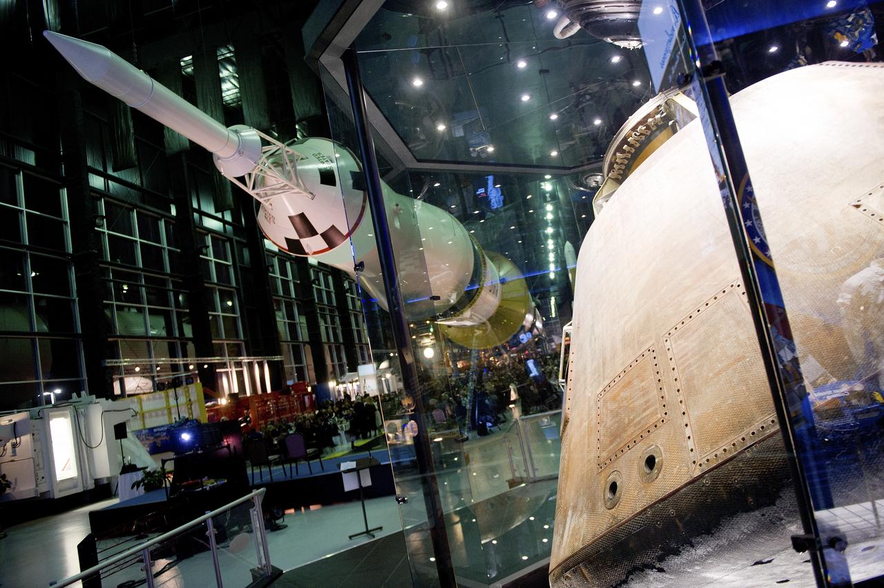 THE APOLLO 16 CAPSULE SITS ON DISPLAY IN THE FOREGROUND OF AN EVENT AT THE DAVIDSON CENTER.  