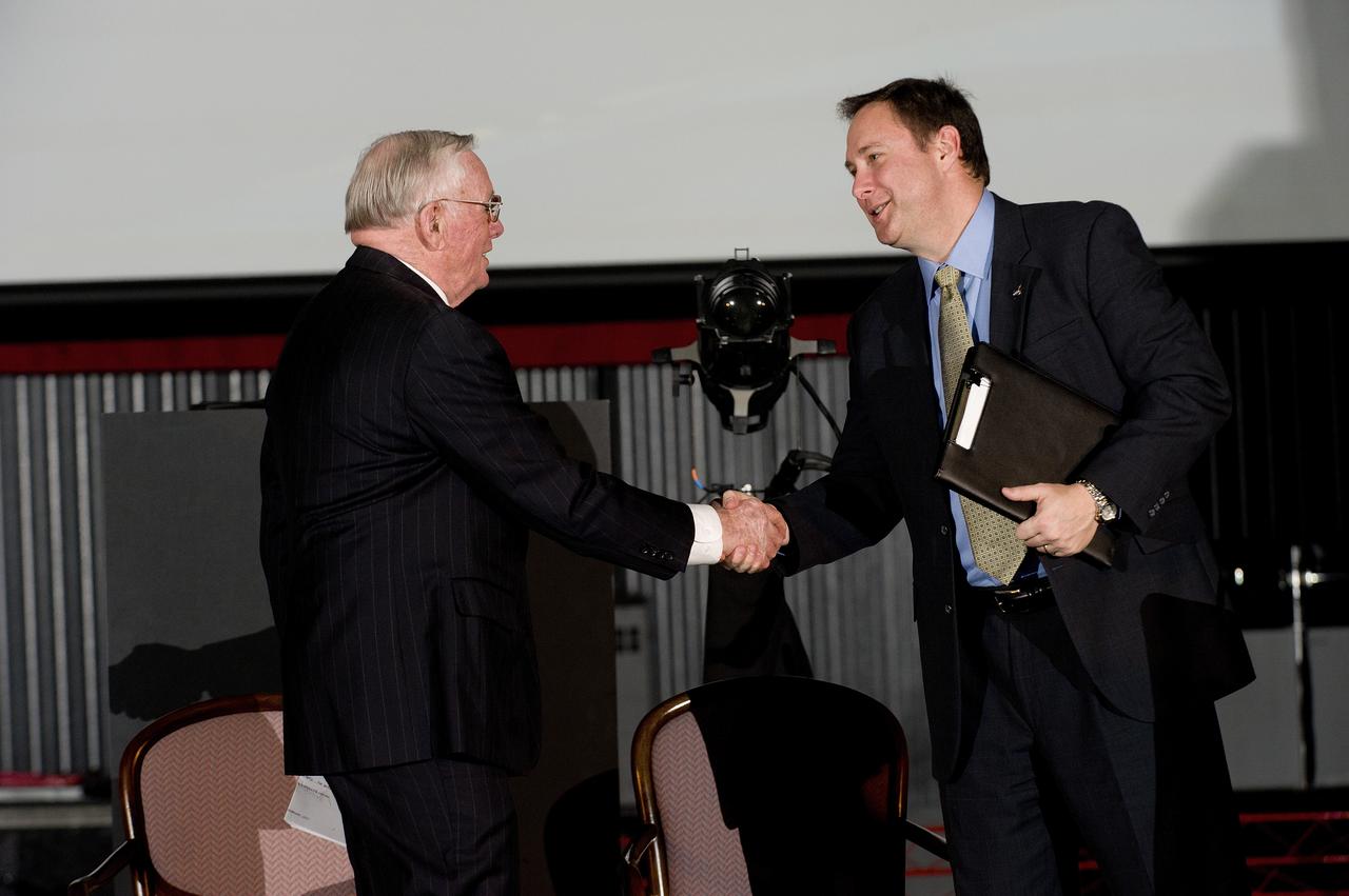 MSFC DIRECTOR ROBERT LIGHTFOOT SHAKES HANDS WITH ASTRONAUT NEIL ARMSTRONG AFTER INTRODUCING HIM AT THE U.S. SPACE AND ROCKET CENTER.  