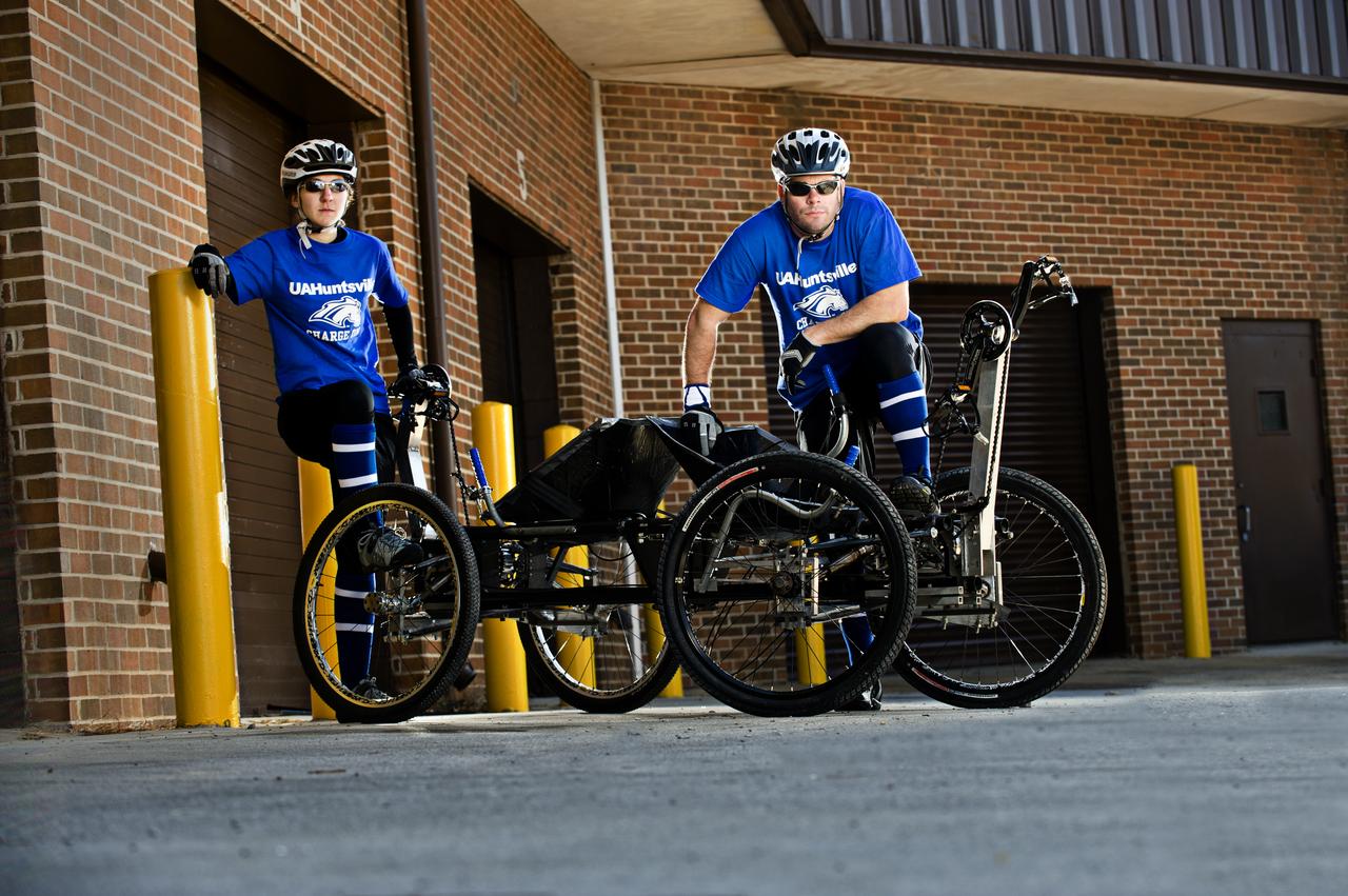 UA HUNTSVILLE’S MIRANDA NELSON AND MICHAEL PATTERSON POSE WITH THE MOONBUGGY THEY WILL DRIVE IN THE 2011 GREAT MOONBUGGY RACE AT THE US SPACE AND ROCKET CENTER.  