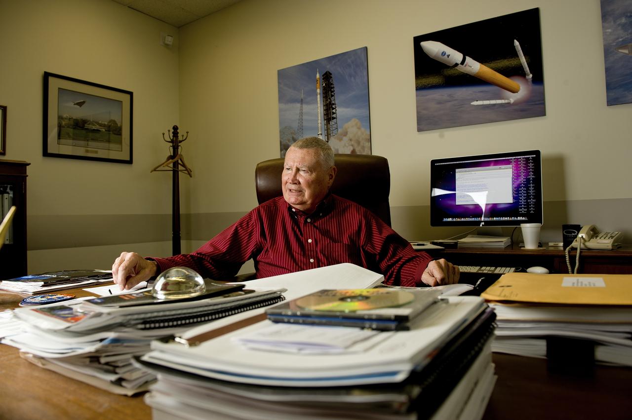 PHIL SUMRALL SITS AT HIS DESK IN BUILDING 4203