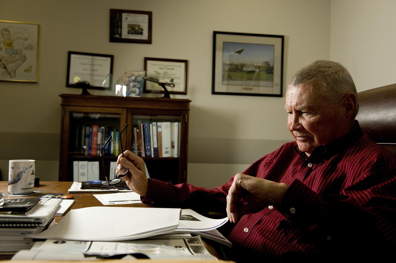 PHIL SUMRALL SITS AT HIS DESK IN BUILDING 4203