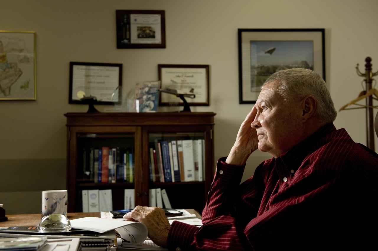 PHIL SUMRALL SITS AT HIS DESK IN BUILDING 4203