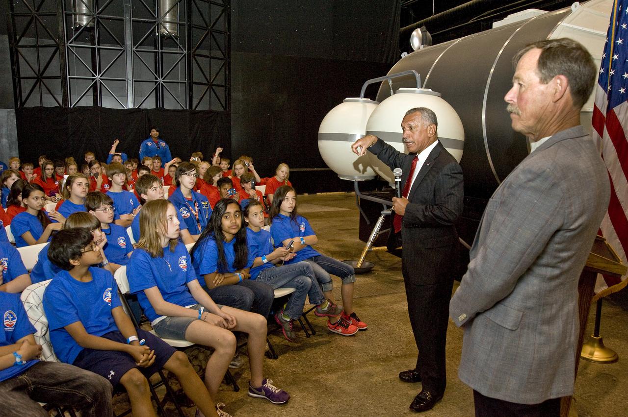 CHARLES BOLDEN NASA ADMINISTRATOR TOURING AND SPEAKING AT THE US. SPACE AND ROCKET CENTER, HUNTSVILLE, ALABAMA. ACCOMPANYING ADMINISTRATOR BOLDEN ARE DR. DEBORAH BARNHART, CEO OF THE USSARC, ROBERT LIGHTFOOT, CENTER DIRECTOR OF MARSHALL SPACE FLIGHT CENTER AND RETIRED NASA ASTRONAUT ROBERT LEE “HOOT” GIBSON, ADMINISTRATOR BOLDEN’S FIRST SPACE FLIGHT COMMANDER.
