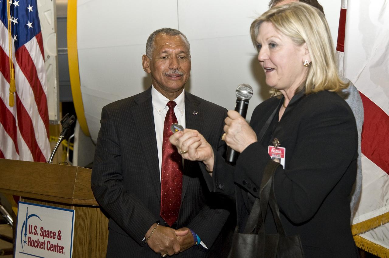 CHARLES BOLDEN NASA ADMINISTRATOR TOURING AND SPEAKING AT THE US. SPACE AND ROCKET CENTER, HUNTSVILLE, ALABAMA. ACCOMPANYING ADMINISTRATOR BOLDEN ARE DR. DEBORAH BARNHART, CEO OF THE USSARC, ROBERT LIGHTFOOT, CENTER DIRECTOR OF MARSHALL SPACE FLIGHT CENTER AND RETIRED NASA ASTRONAUT ROBERT LEE “HOOT” GIBSON, ADMINISTRATOR BOLDEN’S FIRST SPACE FLIGHT COMMANDER.