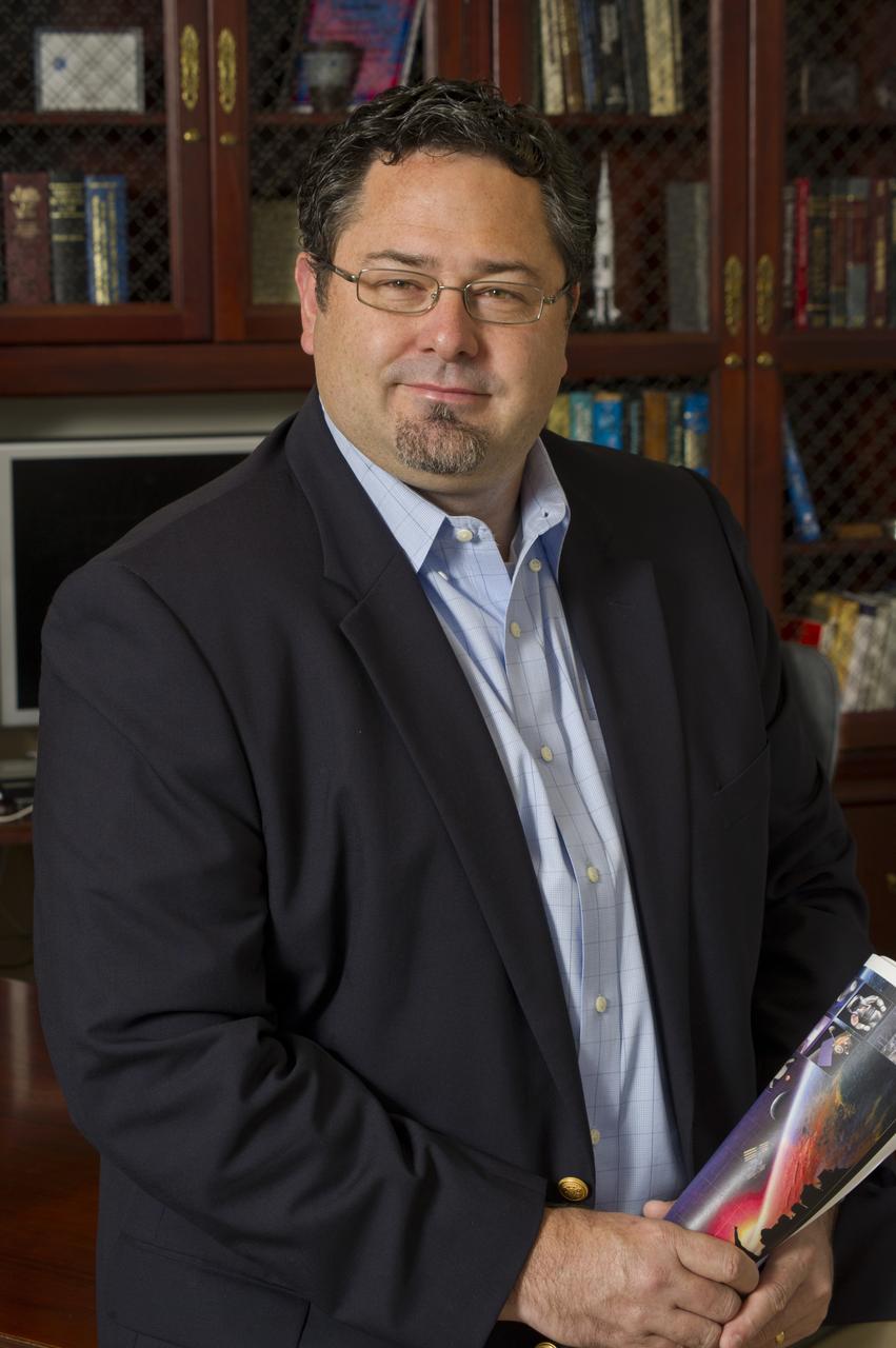 TODD MAY, MANAGER, SPACE LAUNCH SYSTEM, IN HIS OFFICE