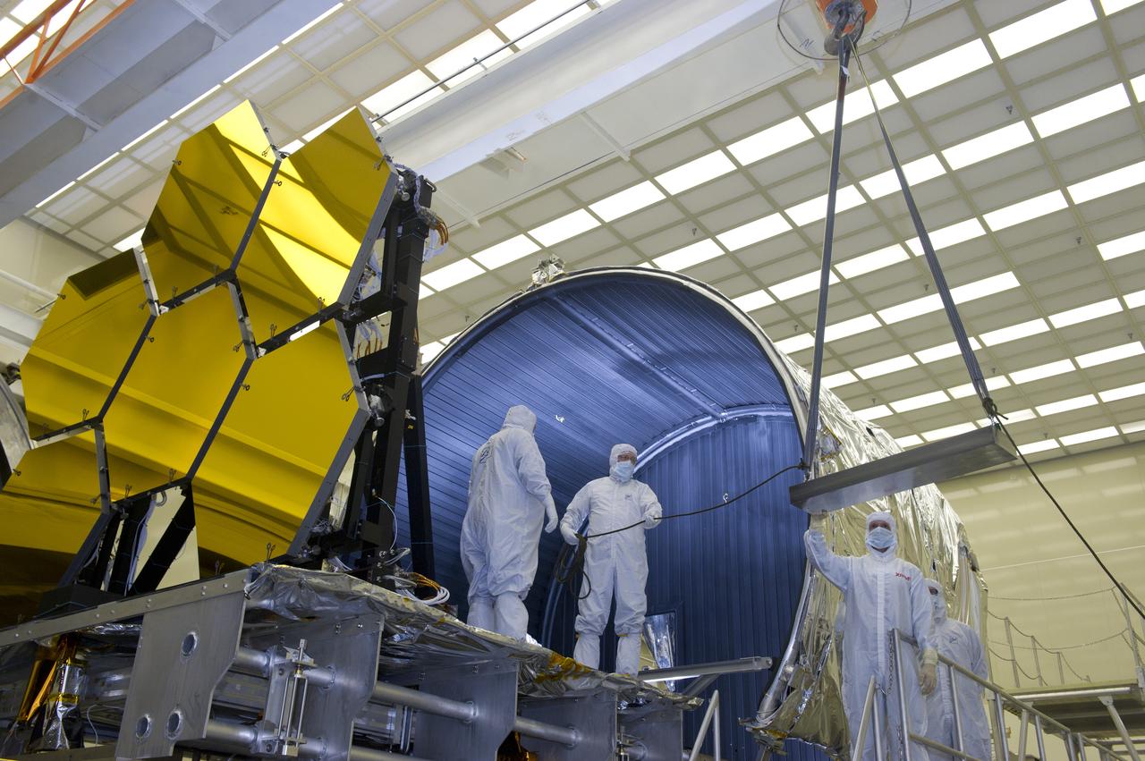BALL AEROSPACE TECHNICIANS REMOVE FINAL SIX  JWST MIRRORS TESTED AT MSFC X-RAY AND CRYOGENIC FACILITY
