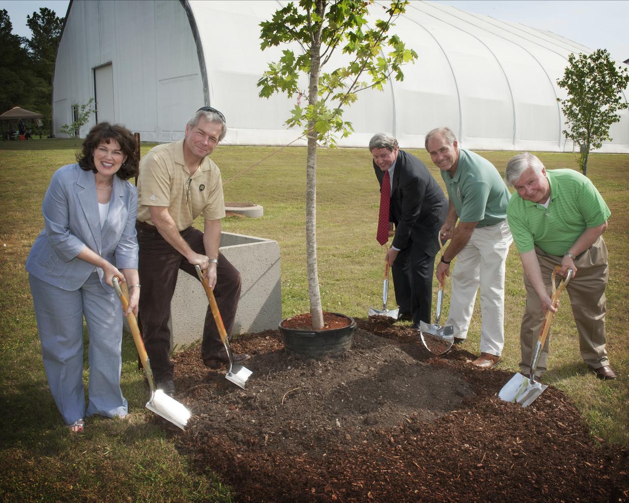 CEREMONIAL TREE PLANTING WIHT (L TO R) ROBIN HENDERSON, STEVE DOERING, GENE GOLDMAN, STEVE CASH, AND ED KIESSLING AT THE 2012 SHE/EARTH DAY EVENT.