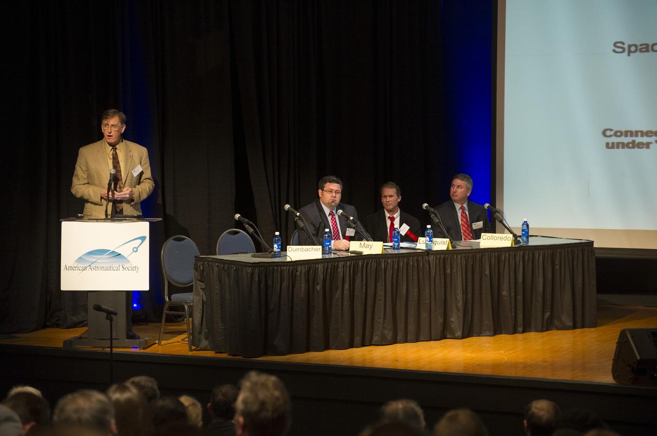 DAN DUMBACHER, LEFT, NASA'S DEPUTY ASSOCIATE ADMINISTRATOR FOR EXPLORATION SYSTEMS DEVELOPMENT, MODERATES A PANEL TITLED "NASA HUMAN SPACE EXPLORATION PLANS AND UPDATE" AT THE 5TH VON BRAUN MEMORIAL SYMPOSIUM AT THE UNIVERSITY OF ALABAMA IN HUNTSVILLE ON OCT. 16. FEATURED PANELISTS INCLUDED, SEATED FROM LEFT, SPACE LAUNCH SYSTEM PROGRAM MANAGER TODD MAY FROM THE MARSHALL SPACE FLIGHT CENTER, ORION CREW AND SERVICE MODULE MANAGER CHARLIE LUNDQUIST FROM THE JOHNSON SPACE CENTER, AND CHIEF ARCHITECT OF THE GROUND SYSTEMS DEVELOPMENT AND OPERATIONS PROGRAM SCOTT COLLOREDO FROM THE KENNEDYSPACE CENTER.