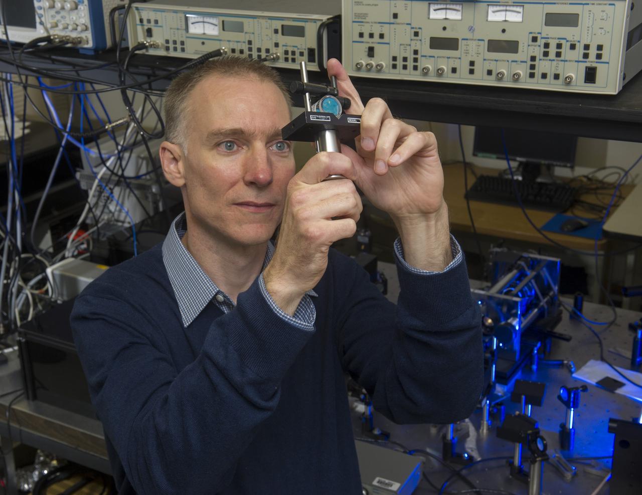 NASA RESEARCHER DR. DAVID SMITH AT NASA’S MARSHALL SPACE FLIGHT CENTER IN HUNTSVILLE, ALA., IS LEADING A THREE-YEAR PROJECT TO REVOLUTIONIZE IN-FLIGHT NAVIGATION SYSTEMS FOR SPACE VEHICLES AND MILITARY AND COMMERCIAL VEHICLES. SMITH AND HIS TEAM SEEK TO REFINE THE HIGHLY SENSITIVE OPTICAL GYROSCOPES THAT DRIVE SPACE VEHICLES’ INERTIAL GUIDANCE SYSTEMS – DELIVERING GYROSCOPES AT LEAST 1,000 TIMES MORE SENSITIVE THAN CURRENT SYSTEMS. 