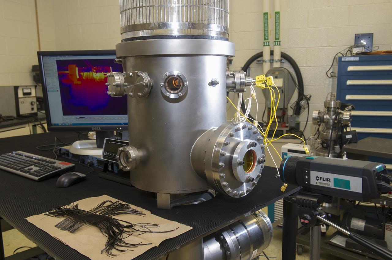 2013 MSFC RADIATOR FACILITY SHOWING THE ZINC SELENIDE WINDOW, THE IR CAMERA, AND A RECENTLY WOVEN UNTESTED CARBON FIBER TEST ARTICLE (LOWER LEFT)-