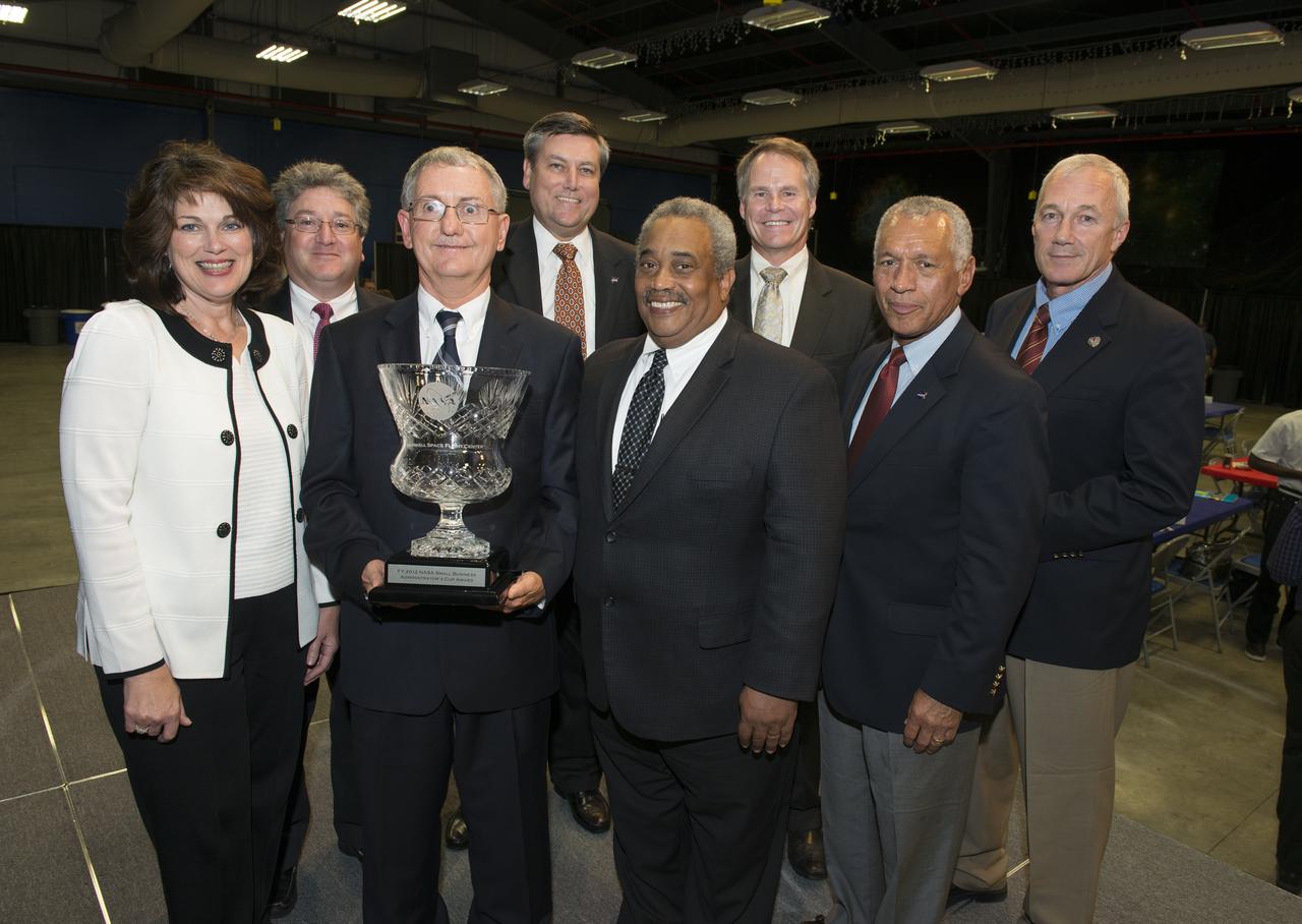 NASA ADMINISTRATOR CHARLES BOLDEN PRESENTS CENTER LEADERS WITH THE SMALL BUSINESS ADMINISTRATOR’S CUP.  PARTICIPATING IN THE AWARD CEREMONY WERE, FROM LEFT, MARSHALL ASSOCIATE DIRECTOR ROBIN HENDERSON, DAVID IOSCO, DEPUTY DIRECTOR OF MARSHALL’S OFFICE OF PROCUREMENT; MARSHALL SMALL BUSINESS SPECIALIST DAVID BROCK; MARSHALL CENTER DIRECTOR PATRICK SCHEUERMANN; GLENN DELGADO, ASSOCIATE ADMINISTRATOR OF NASA’S OFFICE OF SMALL BUSINESS PROGRAMS; KIM WHITSON, DIRECTOR OF MARSHALL’S OFFICE OF PROCUREMENT; NASA ADMINISTRATOR CHARLES BOLDEN; AND TERRY WILCUTT, ASSOCIATE ADMINISTRATOR OF NASA’S OFFICE OF SAFETY AND MISSION ASSURANCE.