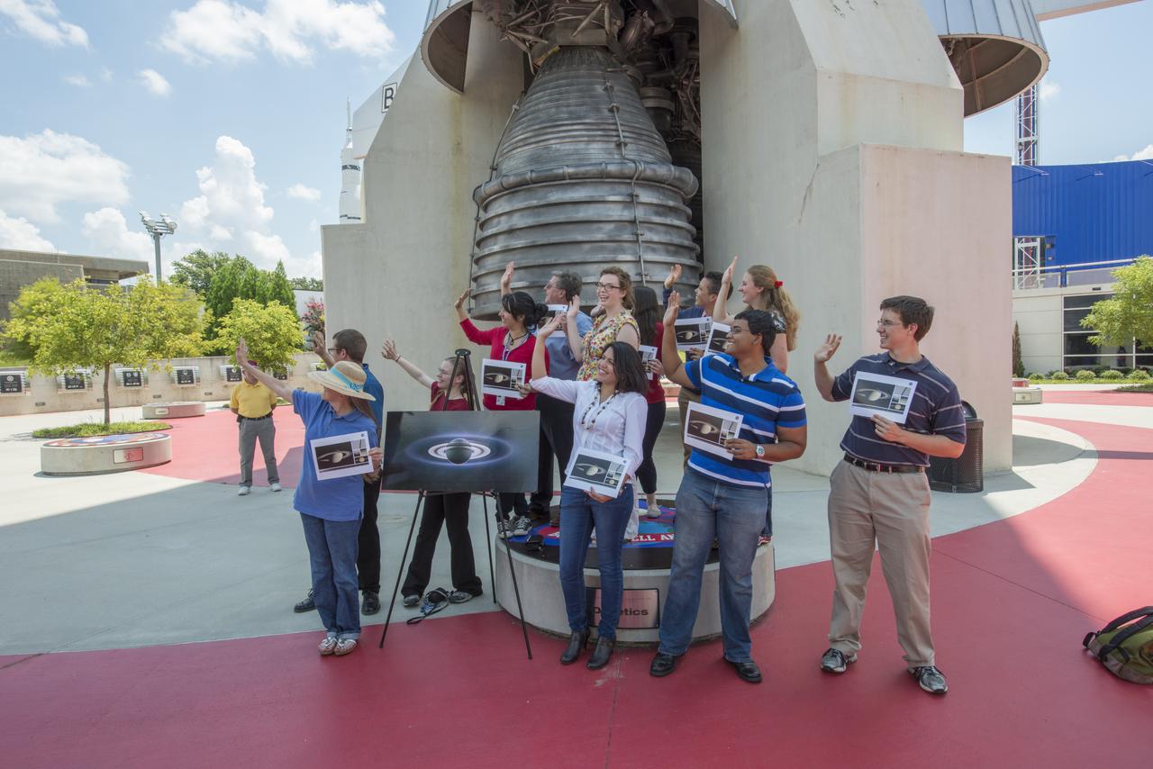 MITZI ADAMS, MARSHALL SCIENTIST, TALKED WITH STUDENTS AT THE U.S. SPACE AND ROCKET CENTER ON FRIDAY, JULY 19 ABOUT THE PLANET SATURN. STUDENTS PARTICIPATED ALONG WITH LEGIONS OF SMILING EARTHLINGS IN A WAVE AT SATURN FOR A COSMIC PHOTO OP AS NASA’S CASSINI TOOK A COSMIC PHOTO OF THE WHOLE SATURN SYSTEM AND EARTH.