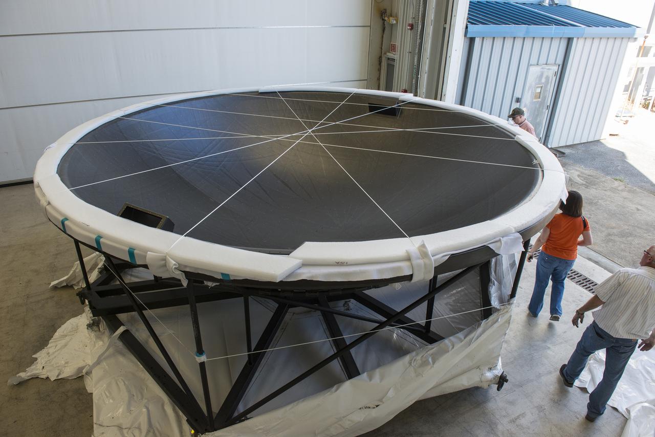 THE ORION EFT-1 DIAPHGRAM BEING UNLOADED AND UNWRAPPED PRIOR TO BEING PLACED IN THE CLEAN ROOM FOR TESTING.