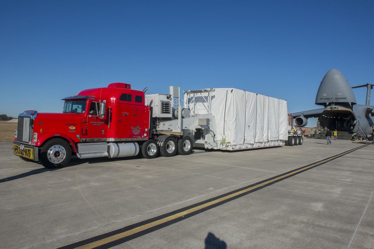 JAMES WEBB SPACE TELESCOPE (JWST) BACKPLANE MOVE FROM MARSHALL SPACE FLIGHT CENTER’S X-RAY CALIBRATION FACILITY (XCRF) TO THE REDSTONE ARSENAL AIRFIELD WHERE THE TEST ARTICLE WAS PLACED IN A USAF C-5 GALAXY FOR IT’S FLIGHT BACK TO THE MANUFACTURER.