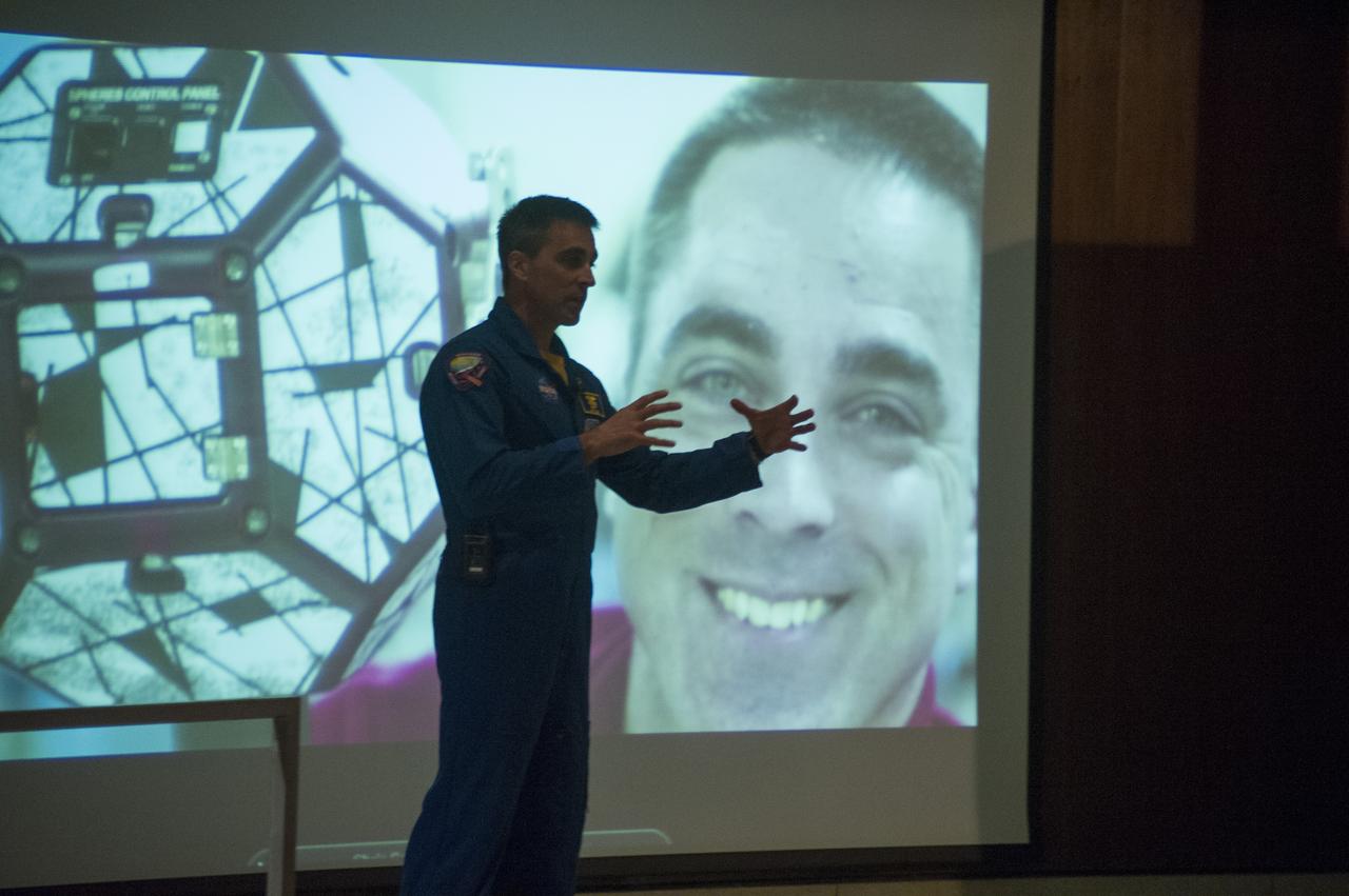 NASA ASTRONAUT CHRIS CASSIDY, A FLIGHT ENGINEER DURING INTERNATIONAL SPACE STATION EXPEDITION 36, TALKS ON-STAGE IN MORRIS AUDITORIUM DURING HIS JAN. 22 VISIT TO THE MARSHALL SPACE FLIGHT CENTER. 