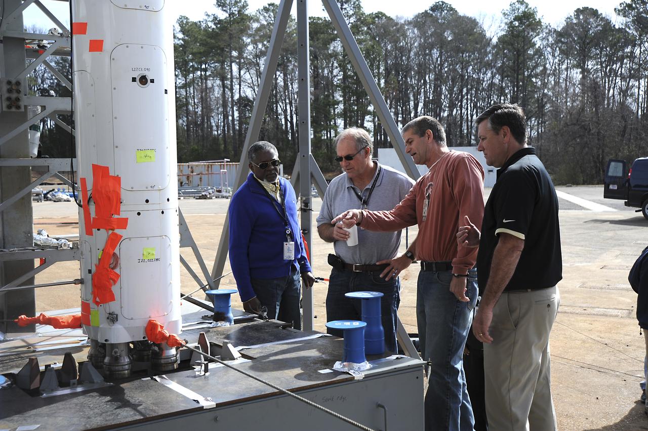 MSFC DIRECTOR PATRICK SCHEUERMANN TOURS THE TEST AREA ALONG WITH SAFETY AND MISSION ASSURANCE DIRECTOR STEVE CASH, DENNIS STRICKLAND, AND JOHN PEA.