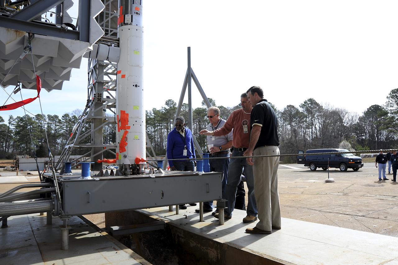 MSFC DIRECTOR PATRICK SCHEUERMANN TOURS THE TEST AREA ALONG WITH SAFETY AND MISSION ASSURANCE DIRECTOR STEVE CASH, DENNIS STRICKLAND, AND JOHN PEA.