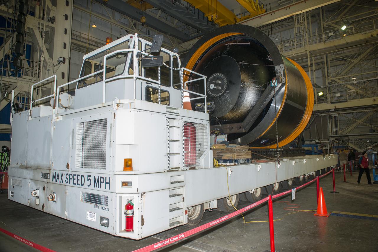NASA AND BOEING ENGINEERS INSPECT AND PREPARE ONE OF THE LARGEST COMPSITE ROCKET PROPELLANT TANKS EVER MANUFACTURED. THE COMPOSITE CRYOTANK PROMISES A 30% WEIGHT REDUCTION AND A 25 % COST REDUCTION OVER THE PREVIOUSLY USED METAL TANKS.