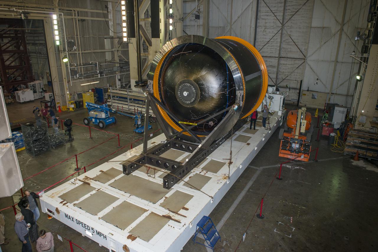 NASA AND BOEING ENGINEERS INSPECT AND PREPARE ONE OF THE LARGEST COMPSITE ROCKET PROPELLANT TANKS EVER MANUFACTURED. THE COMPOSITE CRYOTANK PROMISES A 30% WEIGHT REDUCTION AND A 25 % COST REDUCTION OVER THE PREVIOUSLY USED METAL TANKS.