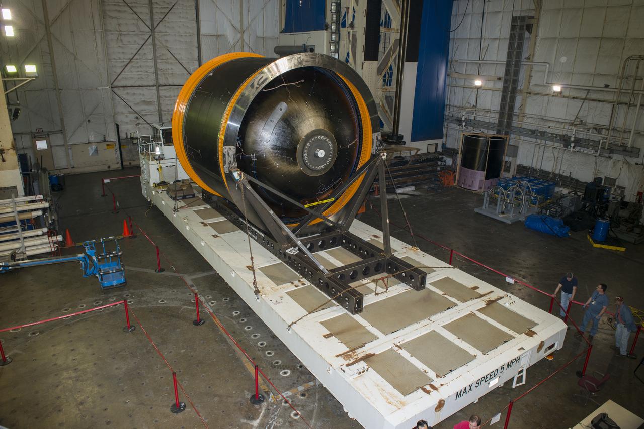 NASA AND BOEING ENGINEERS INSPECT AND PREPARE ONE OF THE LARGEST COMPSITE ROCKET PROPELLANT TANKS EVER MANUFACTURED. THE COMPOSITE CRYOTANK PROMISES A 30% WEIGHT REDUCTION AND A 25 % COST REDUCTION OVER THE PREVIOUSLY USED METAL TANKS.