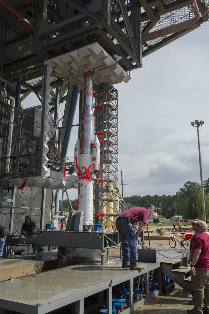 TEST ENGINEER DENNIS STRICKLAND CONDUCTS WATER FLOW TESTS AT TEST STAND 116 FOR SPACE LAUNCH SYSTEM SCALE MODEL ACOUSTIC TEST SERIES (WITH SOLID ROCKET BOOSTERS)