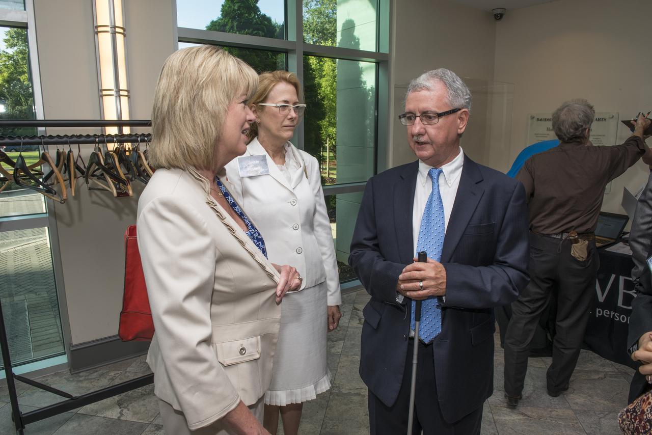 DAVID BROCK, SMALL BUSINESS SPECIALIST AT MSFC, TALKS WITH TERESA VANHOOSER AND JACKIE RYBACKI, AT THE SMBA ESD-HUB ZONE EVENT AT THE HUNTSVILLE MUSEUM OF ART.