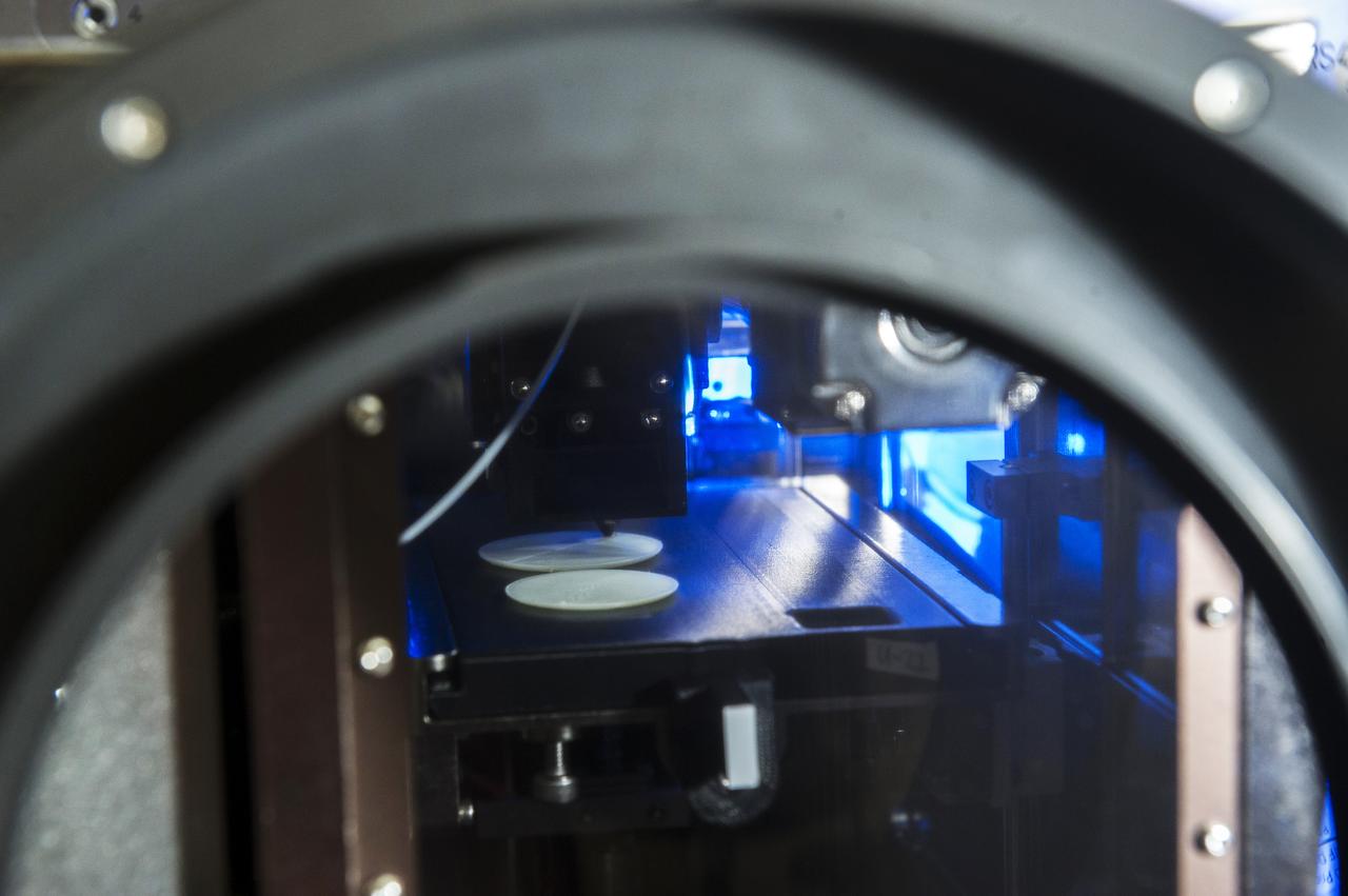 MADE IN SPACE” 3D PRINTER PRINTING TEST SAMPLES WHILE PRINTER IS IN MICROGRAVITY GLOVE BOX
