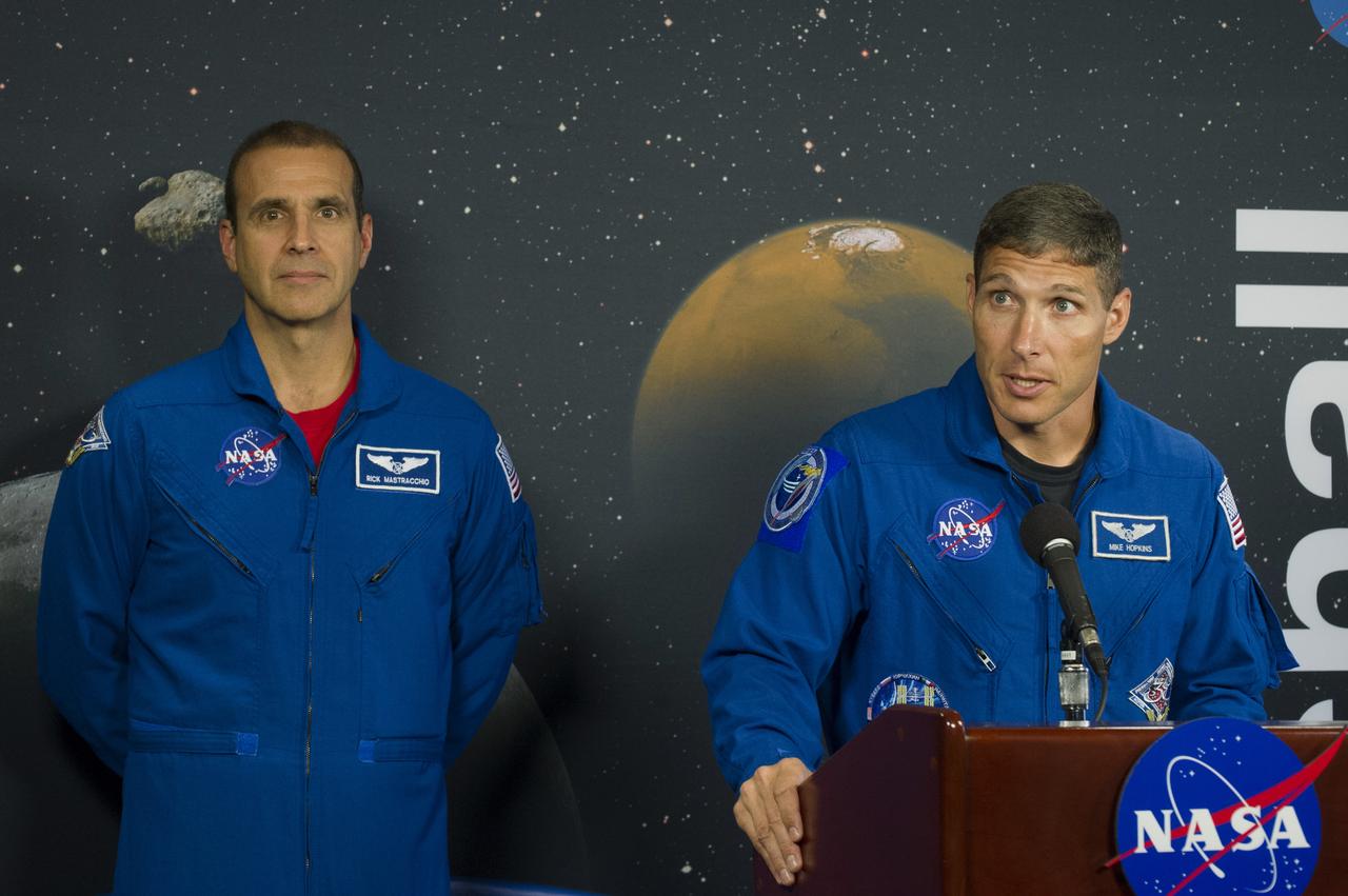 INTERNATIONAL SPACE STATION ASTRONAUTS RICK MASTRACCHIO, LEFT, AND MICHAEL HOPKINS DISCUSS THEIR WORK ON THE SPACE STATION DURING EXPEDITIONS 37, 38, AND 39 AT A NEWS CONFERENCE AT NASA'S MARSHALL SPACE FLIGHT CENTER ON JULY 29