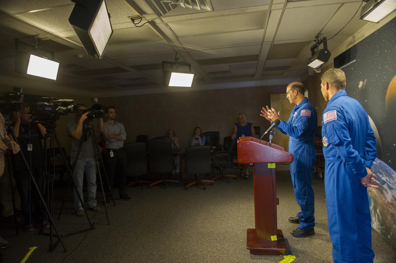 INTERNATIONAL SPACE STATION ASTRONAUTS RICK MASTRACCHIO, LEFT, AND MICHAEL HOPKINS DISCUSS THEIR WORK ON THE SPACE STATION DURING EXPEDITIONS 37, 38, AND 39 AT A NEWS CONFERENCE AT NASA'S MARSHALL SPACE FLIGHT CENTER ON JULY 29