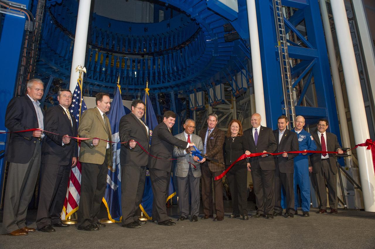 RIBBON CUTTING AT VERTICAL ASSEMBLY CENTER, MICHOUD ASSEMBLY FACILITY, SEPTEMBER 12, 2014, (L TO R):  CLAY KIEFABER, CEO OF ESAB (COMPANY THAT BUILT WELDING TOOL)…PATRICK SCHEUERMANN…ROBERT LIGHTFOOT…TODD MAY…MISSISSIPPI CONGRESSMAN STEVEN PALAZZO…CHARLIE BOLDEN…LOUISIANA SENATOR DAVID VITTER…VIRGINIA BARNES, VICE-PRESIDENT AND PROGRAM MANAGER FOR SLS - BOEING… MITCH LANDRIEU, MAYOR OF NEW ORLEANS… JOHN ELBON, VICE PRESIDENT/GENERAL MANAGER, SPACE EXPLORATIONS – BOEING…PATRICK FORRESTER, ASTRONAUT…ROY MALONE. 