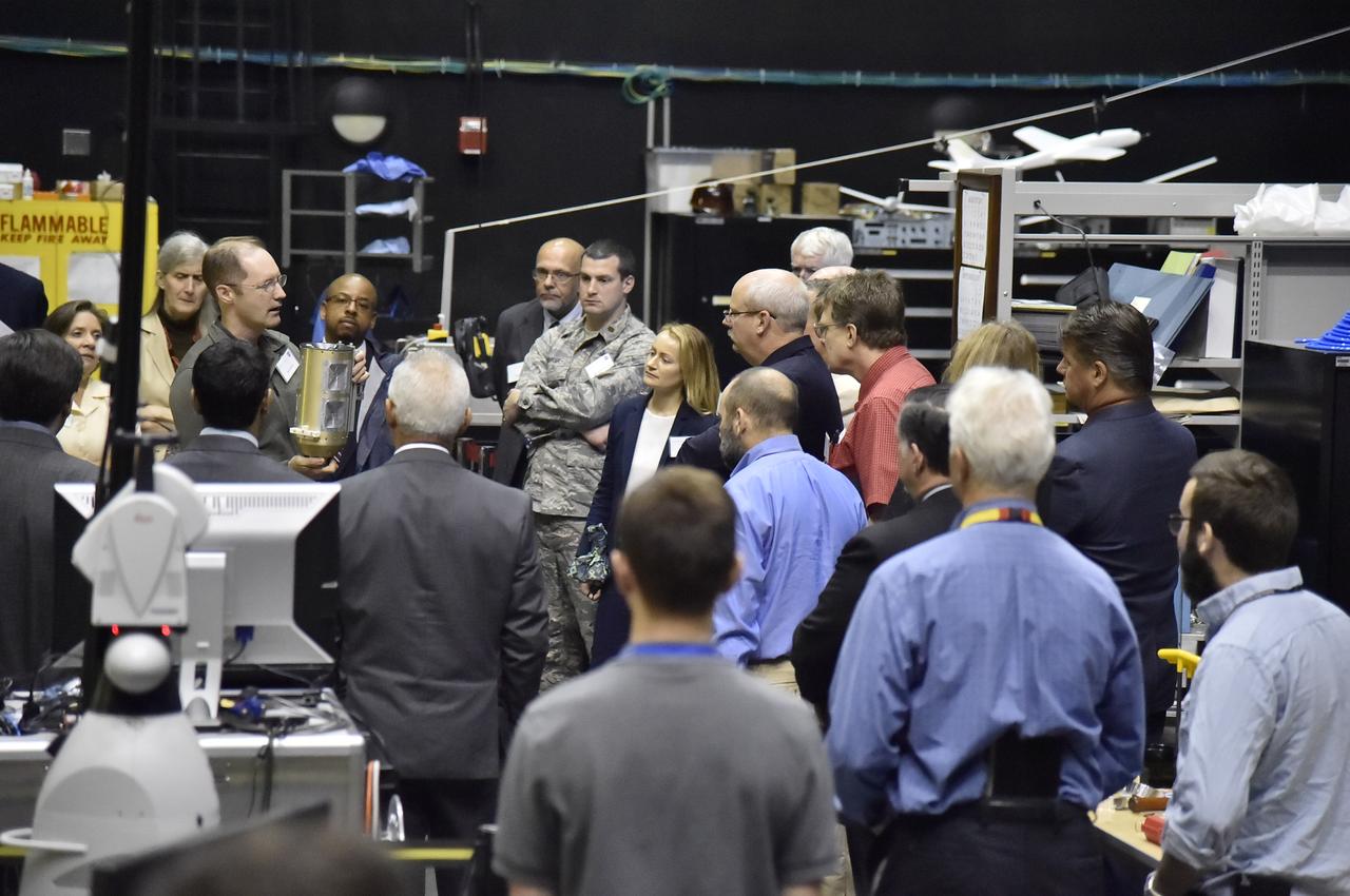 WASHINGTON, D.C.---S&T Partnership Forum In-Space Assembly Technical Interchange Meeting-On September 6th 2017, many of the United States government experts on In-Space Assembly met at the U.S. Naval Research Lab to discuss both technology development and in-space applications that would advance national capabilities in this area. Expertise from NASA, USAF, NRO, DARPA and NRL met in this meeting which was coordinated by the NASA Headquarters, Office of the Chief Technologist. This technical interchange meeting was the second meeting of the members of this Science and Technology Partnership Forum. Glen Henshaw of Code 8231 talks to the group in the Space Robotics Lab.