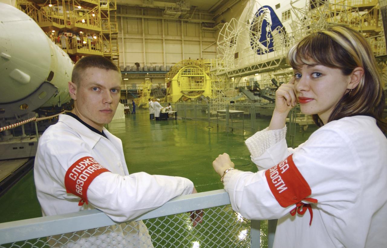 Employees monitor access to the Soyuz integration area at the Baikonur Cosmodrome, Building 254, Soyuz Integration Facility in Kazakhstan, Thursday, April 10, 2003. NASA International Space Station science officer and flight engineer for Expedition 7 astronaut Edward T. Lu and Expedition 7 commander cosmonaut Yuri I. Malenchenko had entered the Soyuz TMA-2 capsule for inspection and seat liner check. Photo Credit: (NASA/Bill Ingalls)