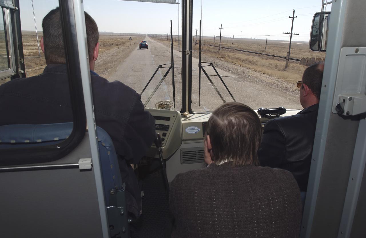 A view out the front of the bus during the long ride back to the Cosmonaut Hotel after the Expedition 7 crew participated in the Sokol suit leak check and the Soyuz vehicle inspection, Thursday, April 10, 2003, in Baikonur, Kazakhstan. Photo Credit: (NASA/Bill Ingalls)