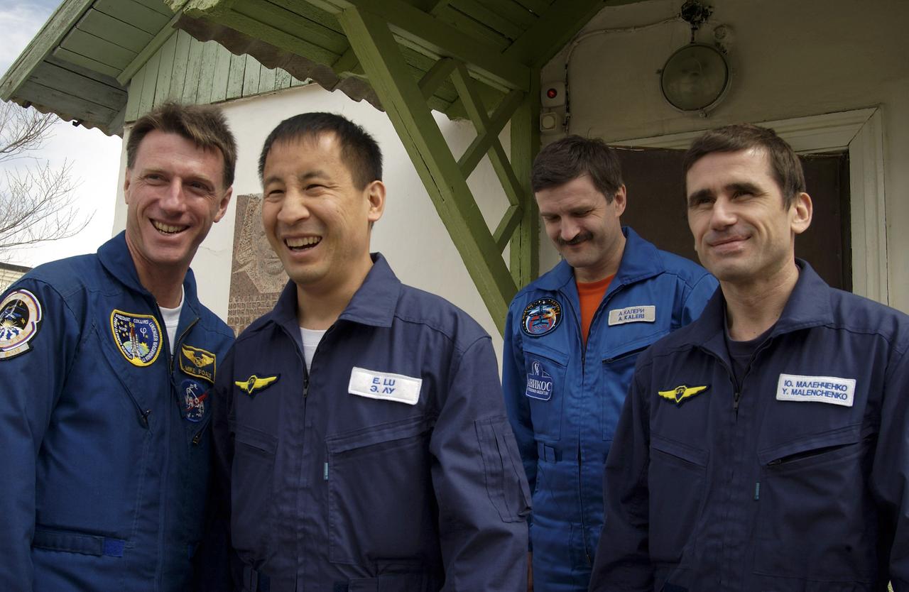 Michael Foale, left, Expedition 7 backup crew member; Edward T. Lu, NASA International Space Station Science Officer and Flight Engineer; Alexander Y. Kaleri, backup crew member; and Yuri I. Malenchenko, Mission Commander, right are pictured as they visit the quarters of Yuri Gagarin after having visited the Soyuz launch pad and performing a final check of the Soyuz capsule at the Baikonur Cosmodrome in Baikonur, Kazakhstan, Tuesday, April 22, 2003. Photo credit: (NASA/Scott Andrews)