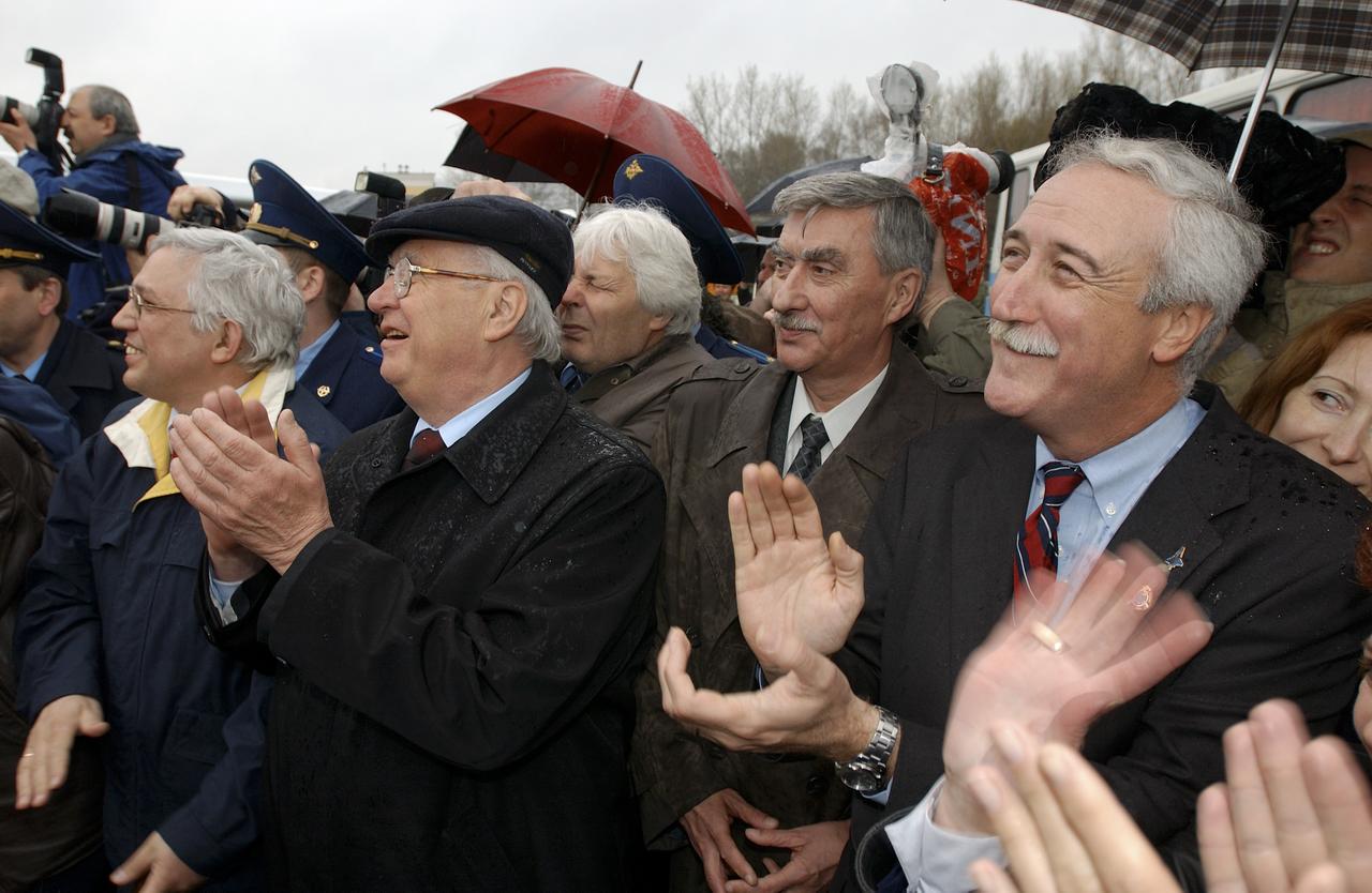 NASA Administrator Sean O'Keefe, right, along with Russian space officials welcome the crew of Expedition 6 as they return from Kazakhstan and the landing of their Soyuz capsule on Tuesday, May 4, 2003 in Star City, Russia.   Photo Credit: (NASA/Bill Ingalls)