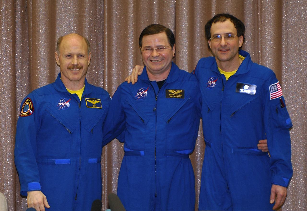 Expedition 6 Flight Engineer Nikolai Budarin, left, Commander Ken Bowersox and International Space Station Science Officer Don Pettit, right, pose for photos at a press conference at the Gagarin Cosmonaut Training Center in Star City, Russia, Thursday, May 6, 2003. Photo Credit: (NASA/Bill Ingalls)
