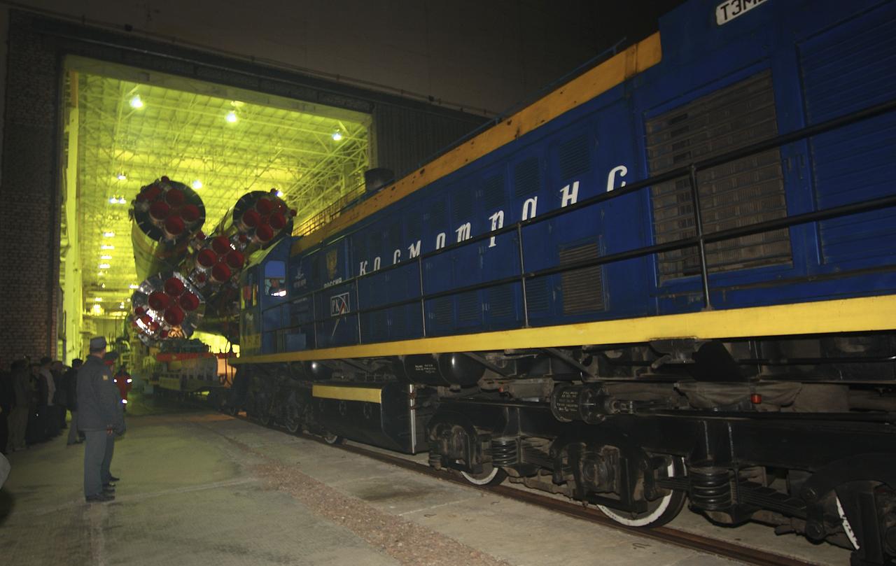 A Soyuz TMA-3 spacecraft and its booster rocket is seen, Thursday, Oct. 16, 2003, on a rail car to be transported to the launch pad and raised to its vertical launch position at the Baikonur Cosmodrome, Kazakhstan in preparation for liftoff Oct. 18, 2003. Photo Credit (NASA/Bill Ingalls)
