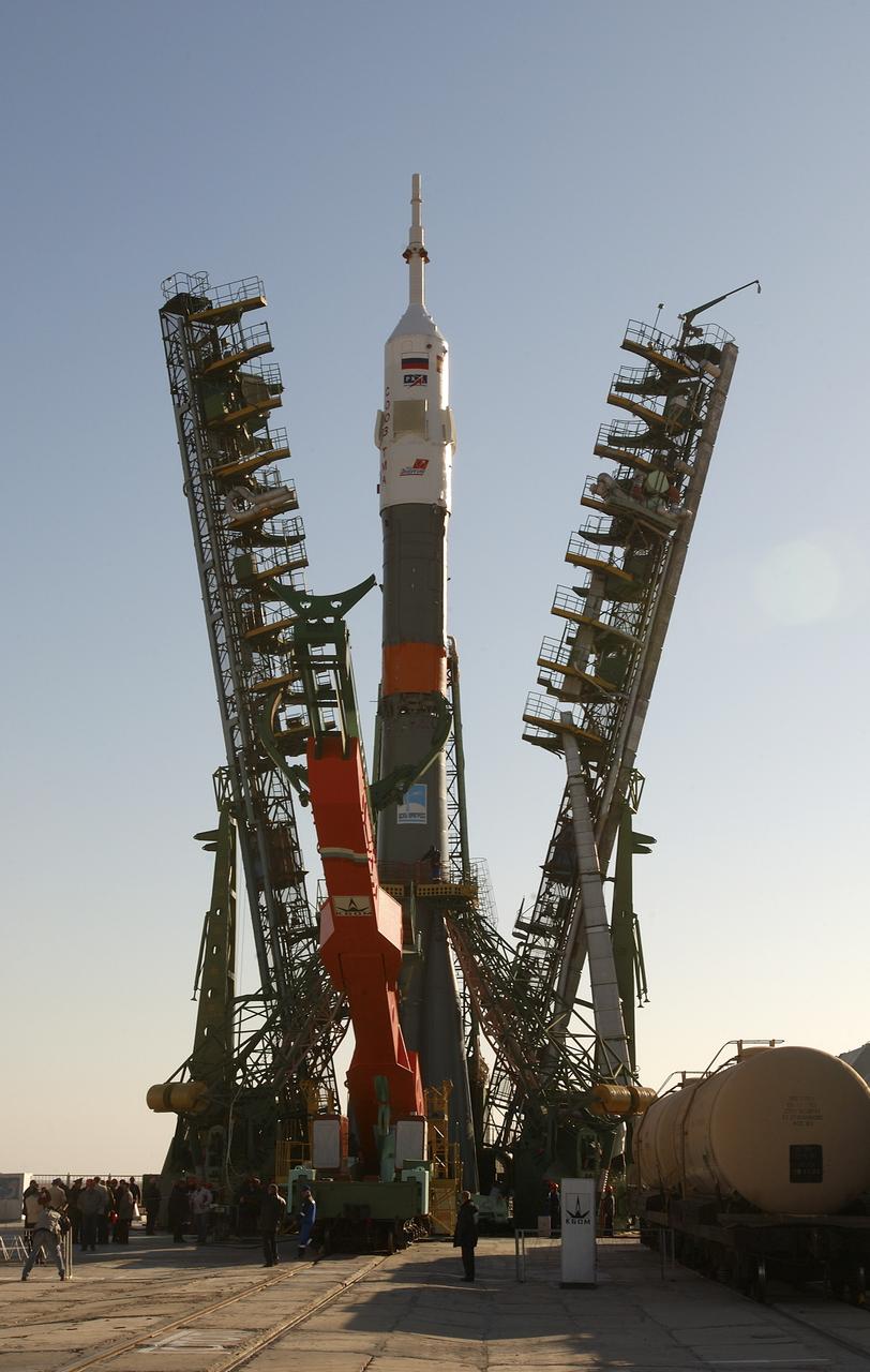 A Soyuz TMA-3 spacecraft and its booster rocket is seen, Thursday, Oct. 16, 2003, on the launch pad at the Baikonur Cosmodrome, Kazakhstan during preparations for liftoff Oct. 18 to carry Expedition 8 Commander and NASA Science Officer Michael Foale, Expedition 8 Soyuz Commander Alexander Kaleri and European Space Agency astronaut Pedro Duque of Spain to the International Space Station. Photo Credit (NASA/Bill Ingalls)