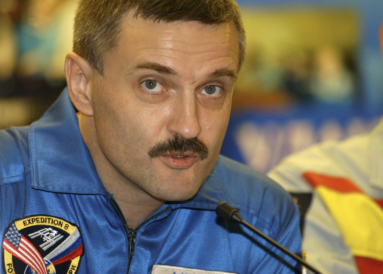 Expedition 8 Soyuz Commander Alexander Kaleri responds to a reporter's question during a prelaunch news conference, Friday, Oct. 17, 2003 in Baikonur, Kazakhstan. Kaleri, Expedition 8 Commander and NASA Science Officer Mike Foale and European Space Agency astronaut Pedro Duque of Spain launched Oct. 18 to the International Space Station. Photo Credit (NASA/Bill Ingalls)