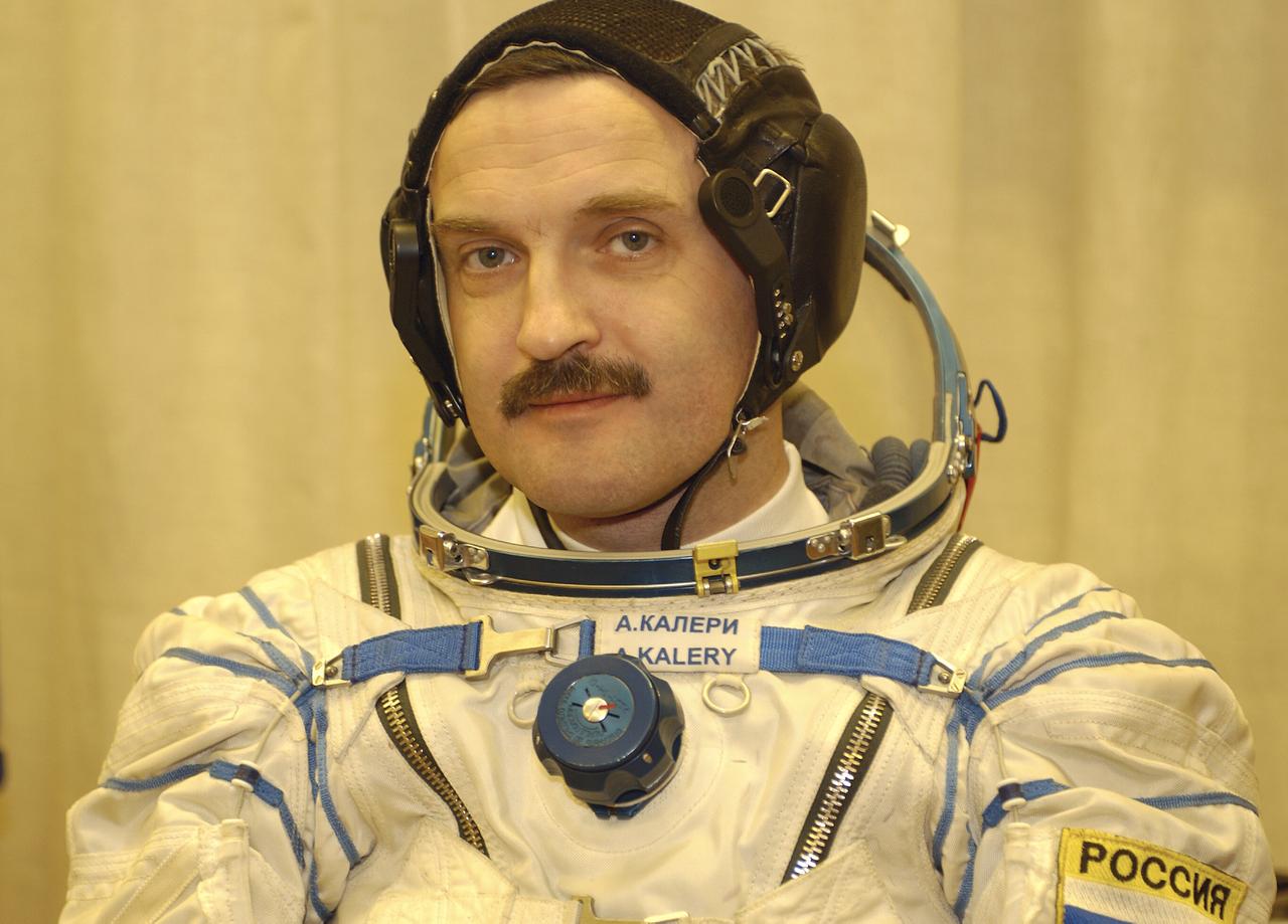 Expedition 8 Soyuz Commander Alexander Kaleri suits up, Saturday, Oct. 18, 2003, at the Baikonur Cosmodrome in Kazakhstan prior to his departure for the launch pad with Expedition 8 Commander and NASA Science Officer Mike Foale and European Space Agency astronaut Pedro Duque. The trio were launched on the Soyuz TMA-3 vehicle to the International Space Station, arriving on Oct. 20. Photo Credit (NASA/Bill Ingalls)