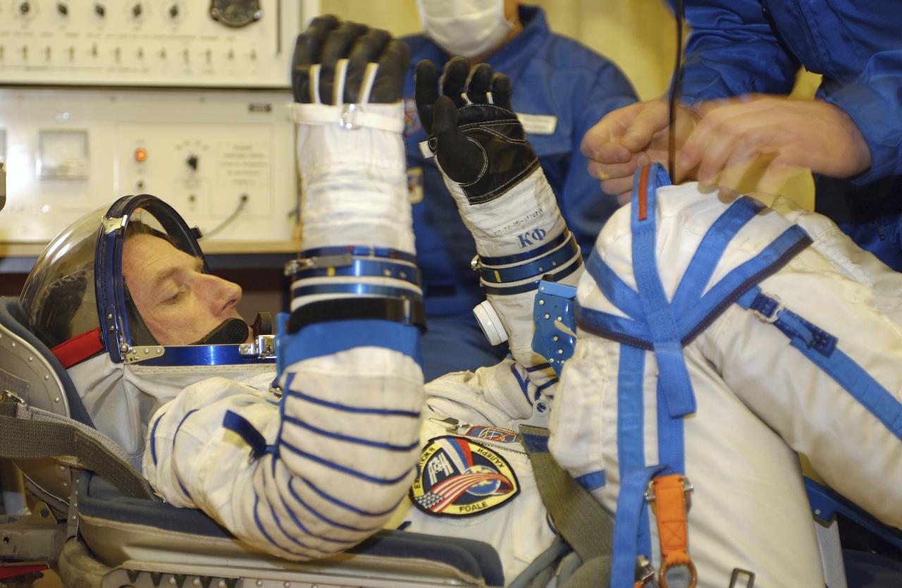 Expedition 8 Commander and NASA Science Officer Michael Foale is seen at the Baikonur Cosmodrome in Kazakhstan. Foale, Expedition 8 Soyuz Commander Alexander Kaleri and European Space Agency astronaut Pedro Duque of Spain were launched on a Soyuz TMA-3 vehicle to the International Space Station, arriving on Oct. 20. Photo Credit (NASA/Bill Ingalls)