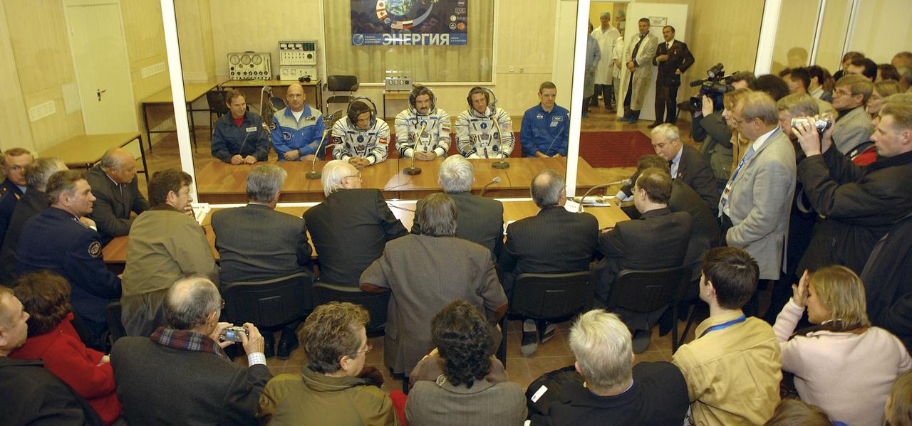 The prime and backup crews for the Expedition 8 mission to the International Space Station and the prime and backup European Space Agency astronauts receive final well-wishes from Russian and U.S. space officials at the Baikonur Cosmodrome in Kazakhstan. Saturday, Oct. 18, 2003, before launch. Expedition 8 Commander and NASA Science Officer Michael Foale, Expedition 8 Soyuz Commander Alexander Kaleri and the ESA's Pedro Duque of Spain were launched on a Soyuz TMA-3 vehicle, arriving at the ISS on Oct. 20. Photo Credit (NASA/Bill Ingalls)
