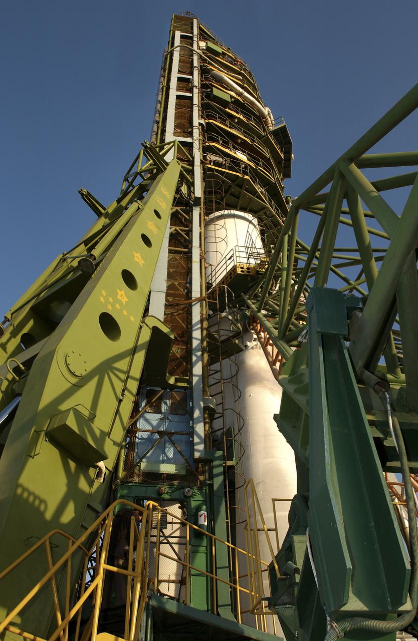 Expedition 8 Soyuz Commander Alexander Kaleri, Expedition 8 Commander and NASA Science Officer Michael Foale along with European Space Agency astronaut Pedro Duque, not seen, ride the elevator to the top of the Soyuz rocket at the Baikonur Cosmodrome in Kazakhstan, Saturday, Oct. 18, 2003, prior to launch in a Soyuz TMA-3 vehicle to the International Space Station, arriving on Oct. 20. Photo Credit (NASA/Bill Ingalls)